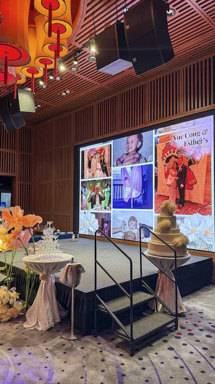 Merry live wall displayed on the wedding stage